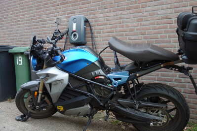 Electric motorcycle and charger